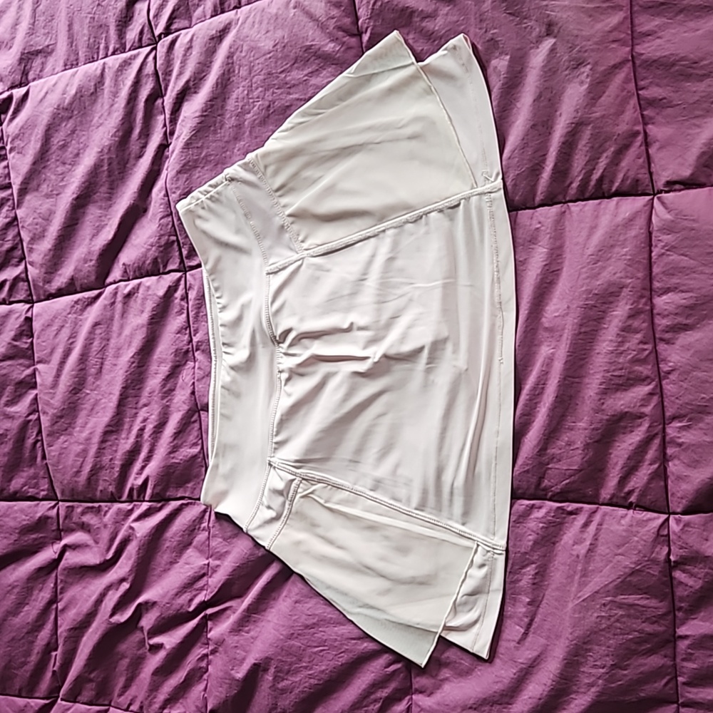 Pretty pastel pink activewear skort with sheer outer layer size M.